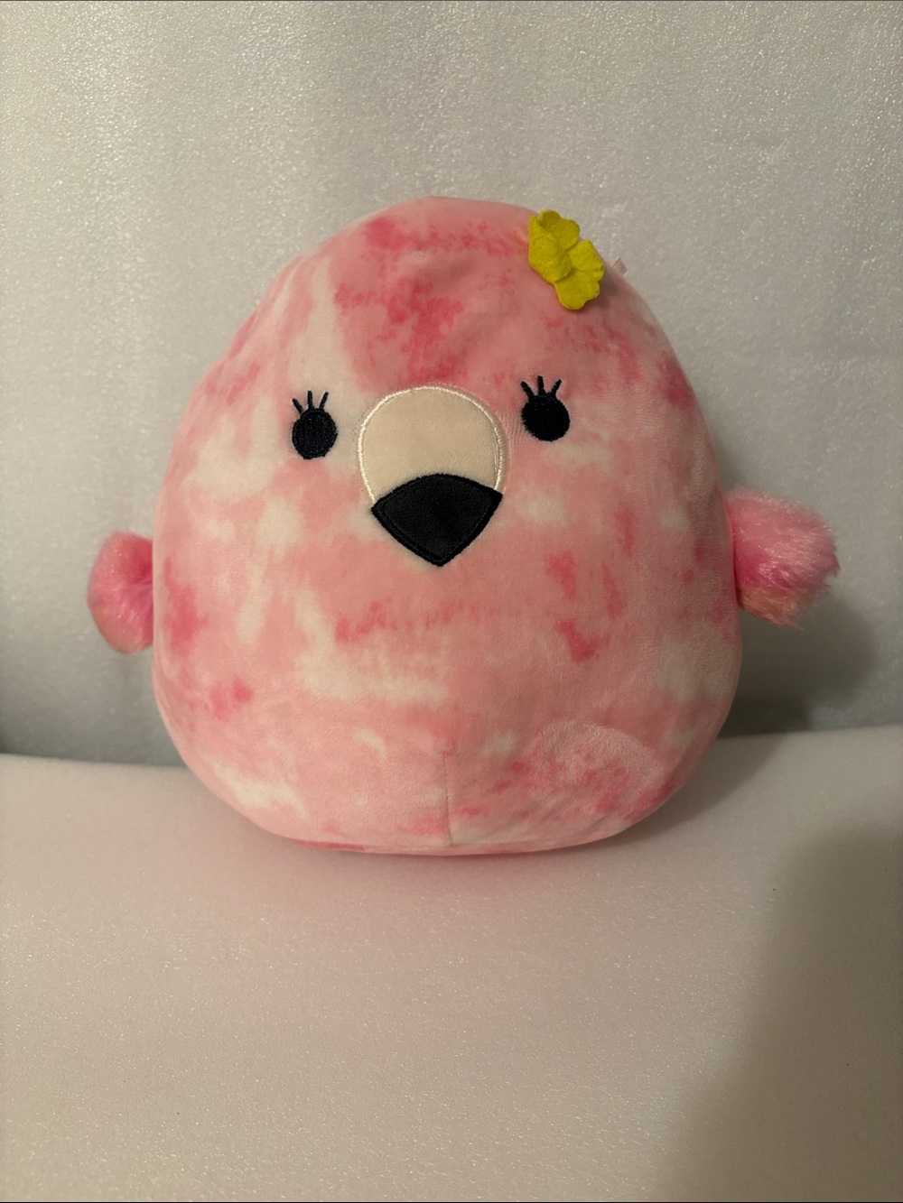 Squishmallows Pink Tie-Dye Bird with Yellow Flower Accent